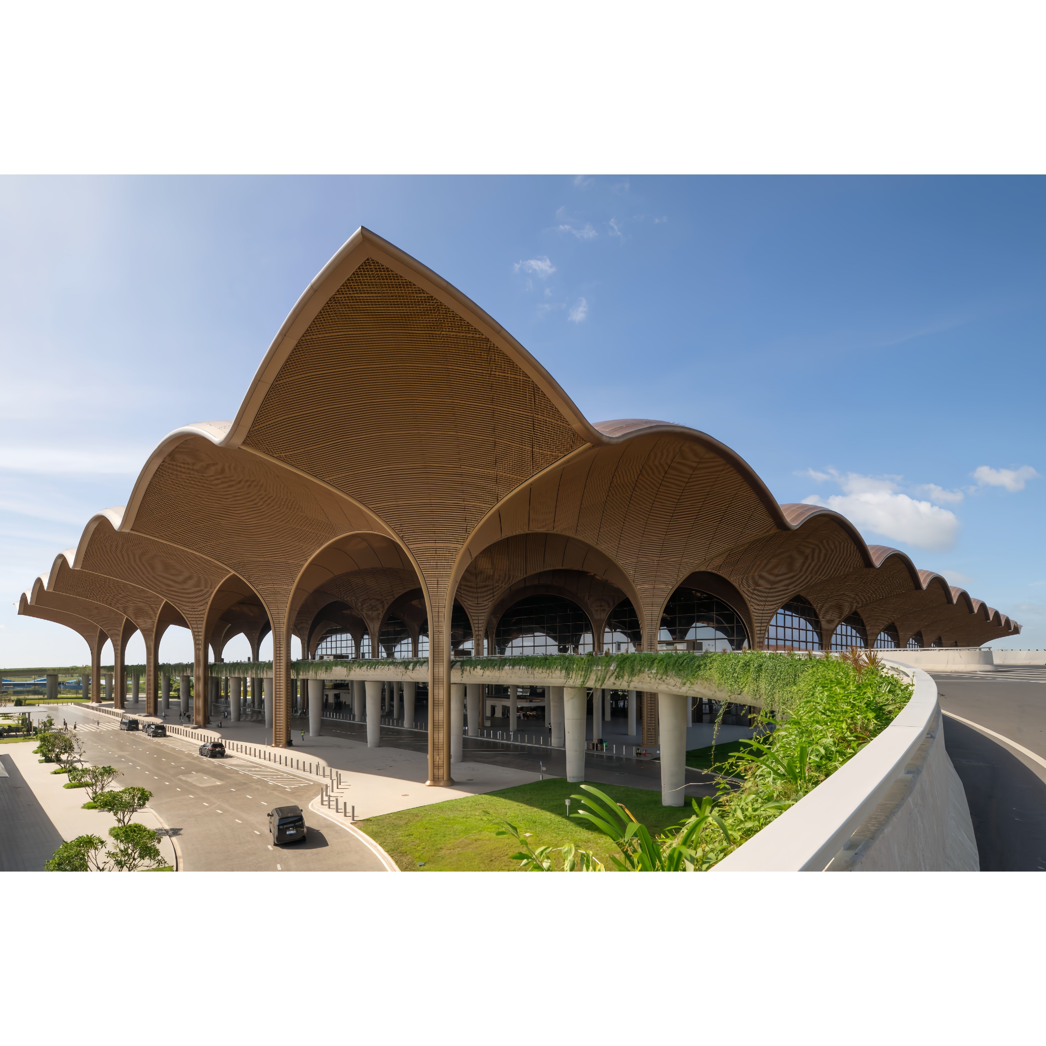 Techo International Airport Cambodia terminal with wave-shaped roof and elevated access road