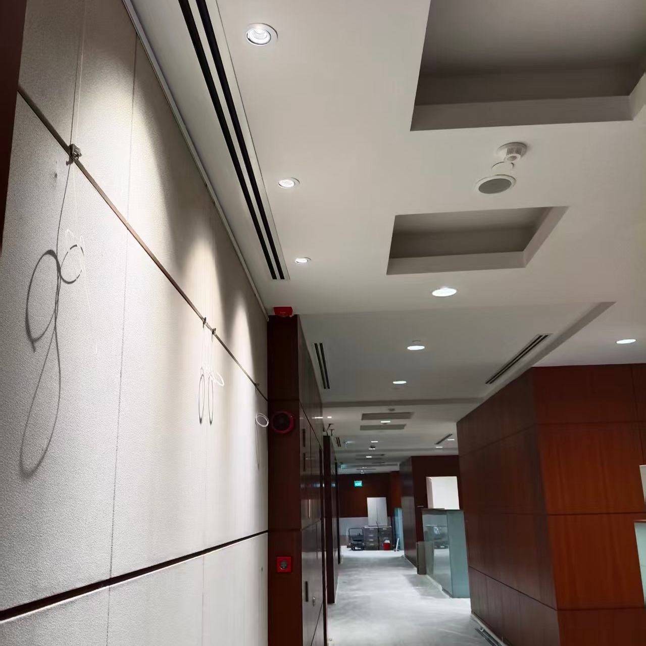 Recessed LED downlights illuminating the public corridor of the URA project in Singapore