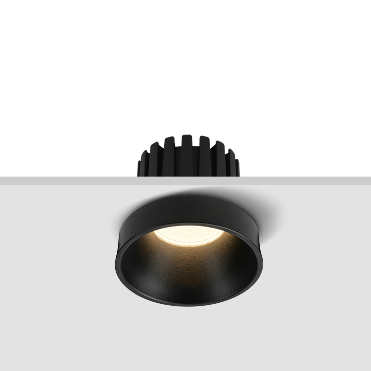 Black IBSP117 semi-recessed LED downlight installed in a ceiling